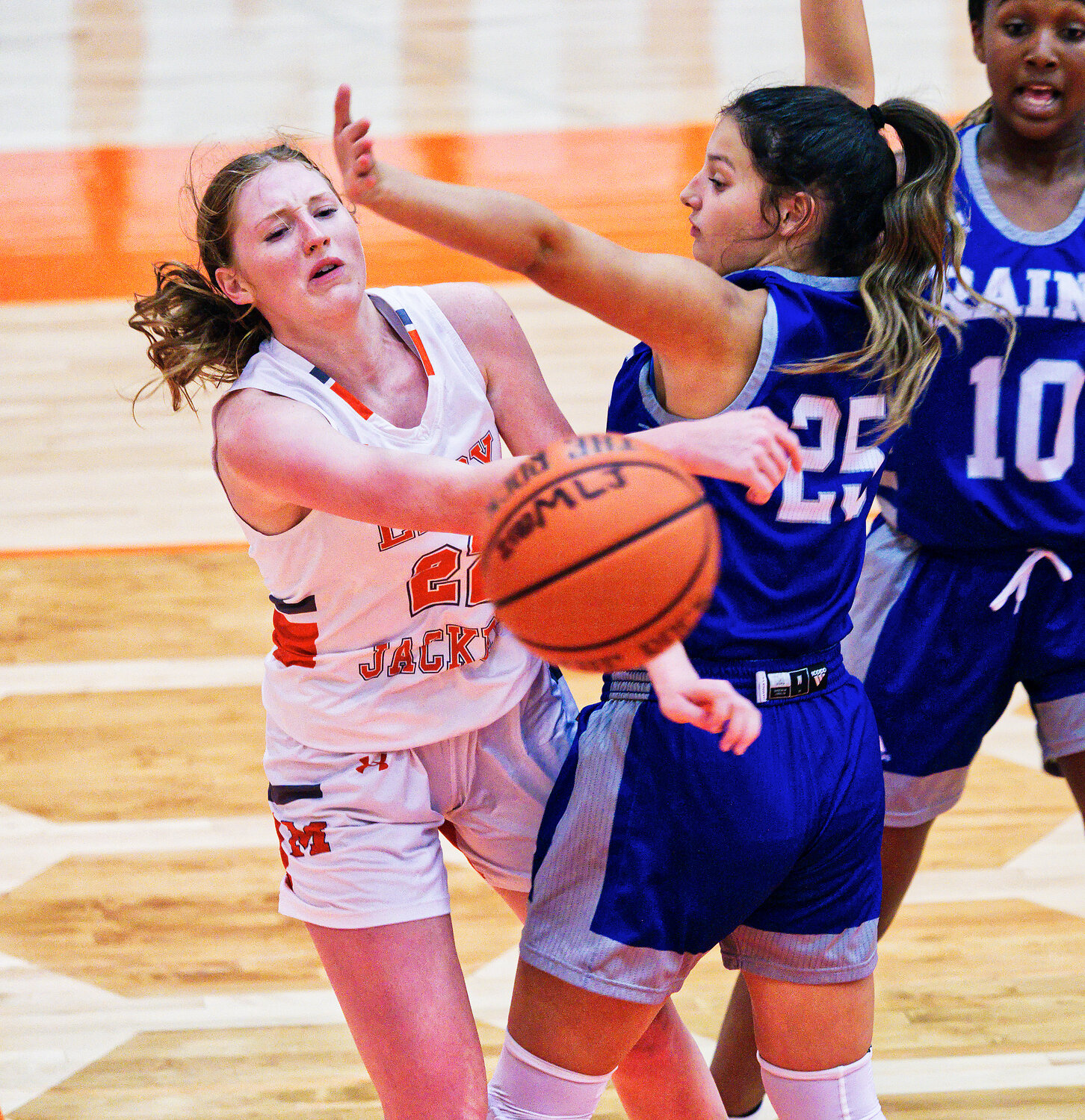 Macy Fischer dishes the ball along the baseline. [more hoops highlights here]